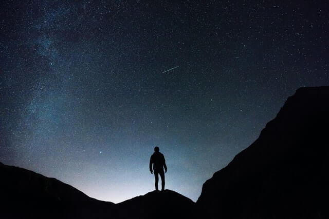 Man hiking at night