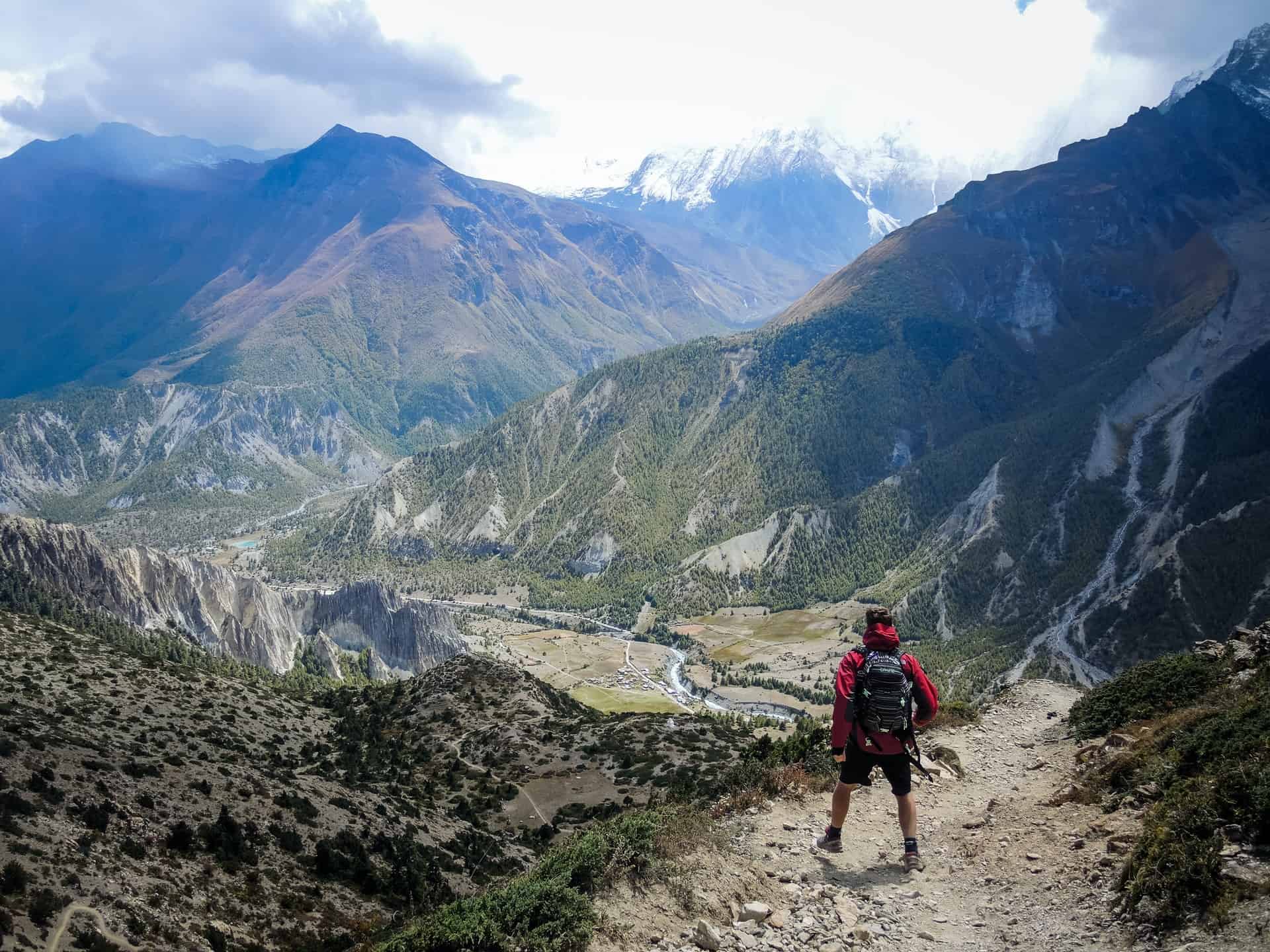 Man wearing hiking jacket on mountain