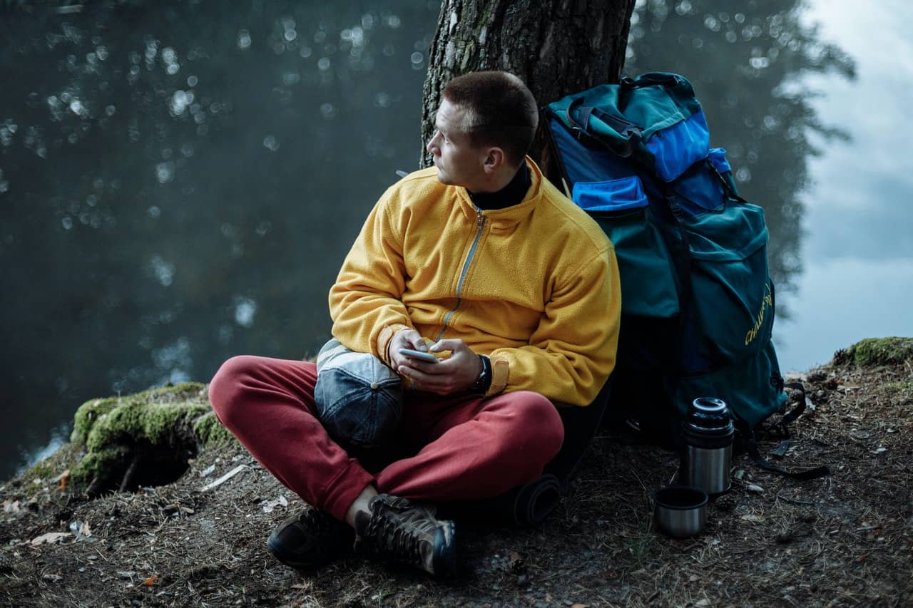 Man wearing waterproof rain jacket